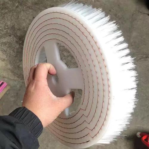 Braided-rope bristle construction on a conventional brush disc