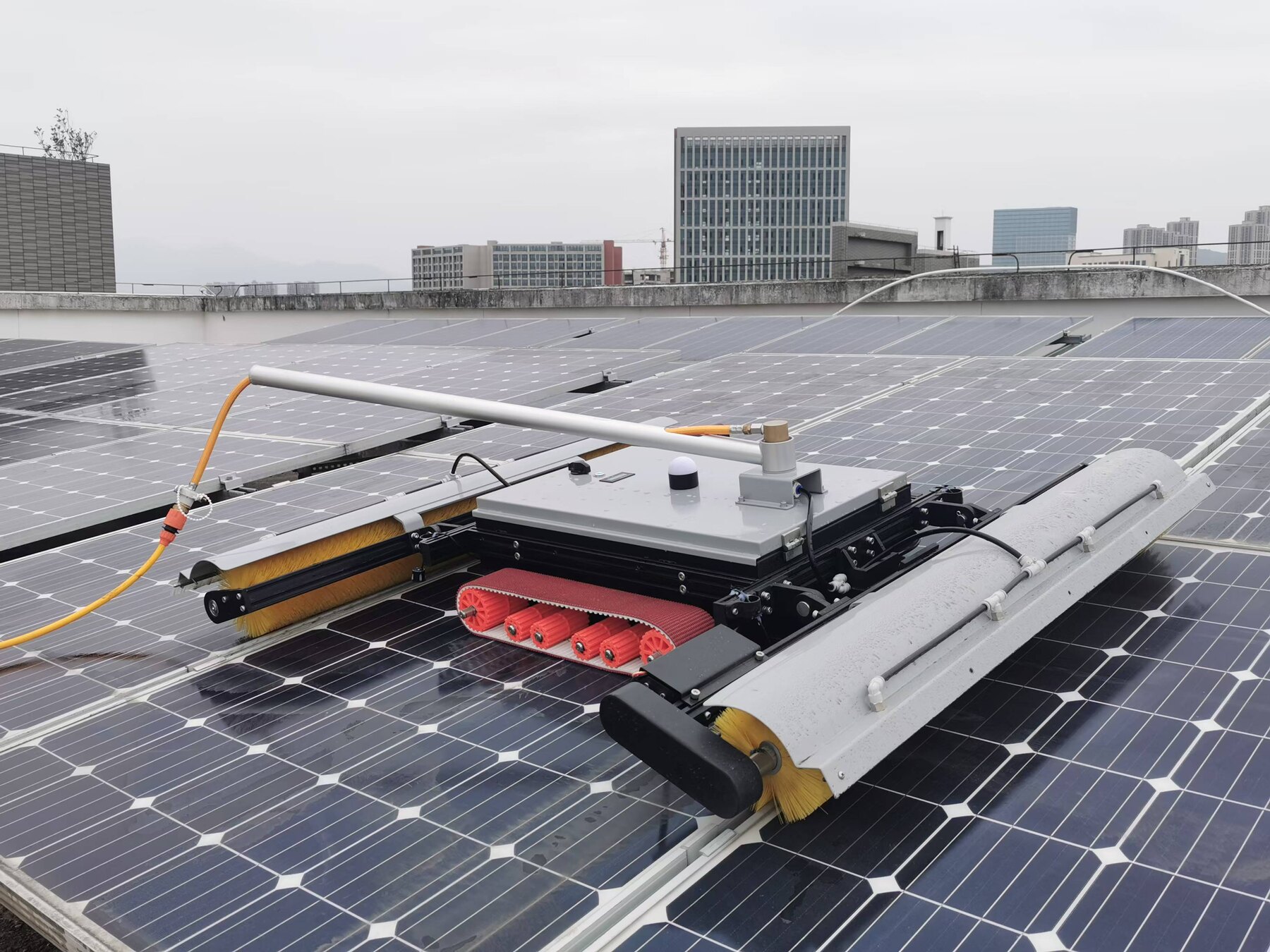 WSE cleaning robot at work on a real commercial rooftop installation